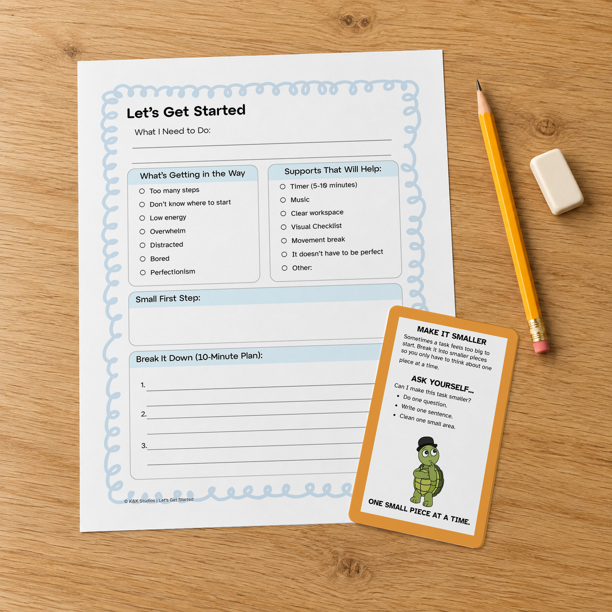 First Step Finder page and Make It Smaller strategy card on a wooden table with a pencil and eraser.