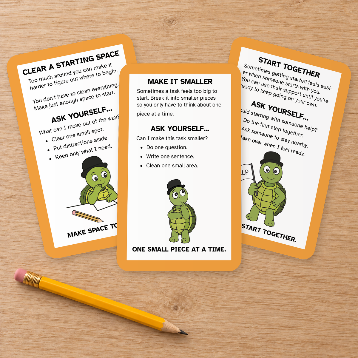 Three Task Initiation strategy cards fanned on a wooden table beside a pencil.